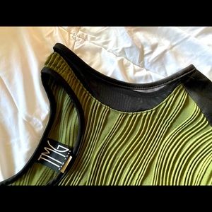 green and black form fitting cocktail dress